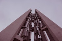 a clock tower with a cloudy sky