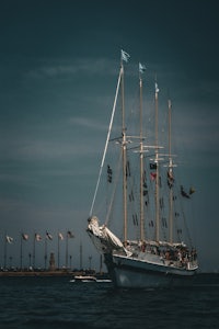 a large sailboat in the water