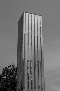 a clock tower in black and white