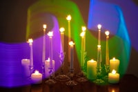 a group of colorful candles on a table