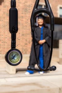 a stethoscope with a graduate in front of it